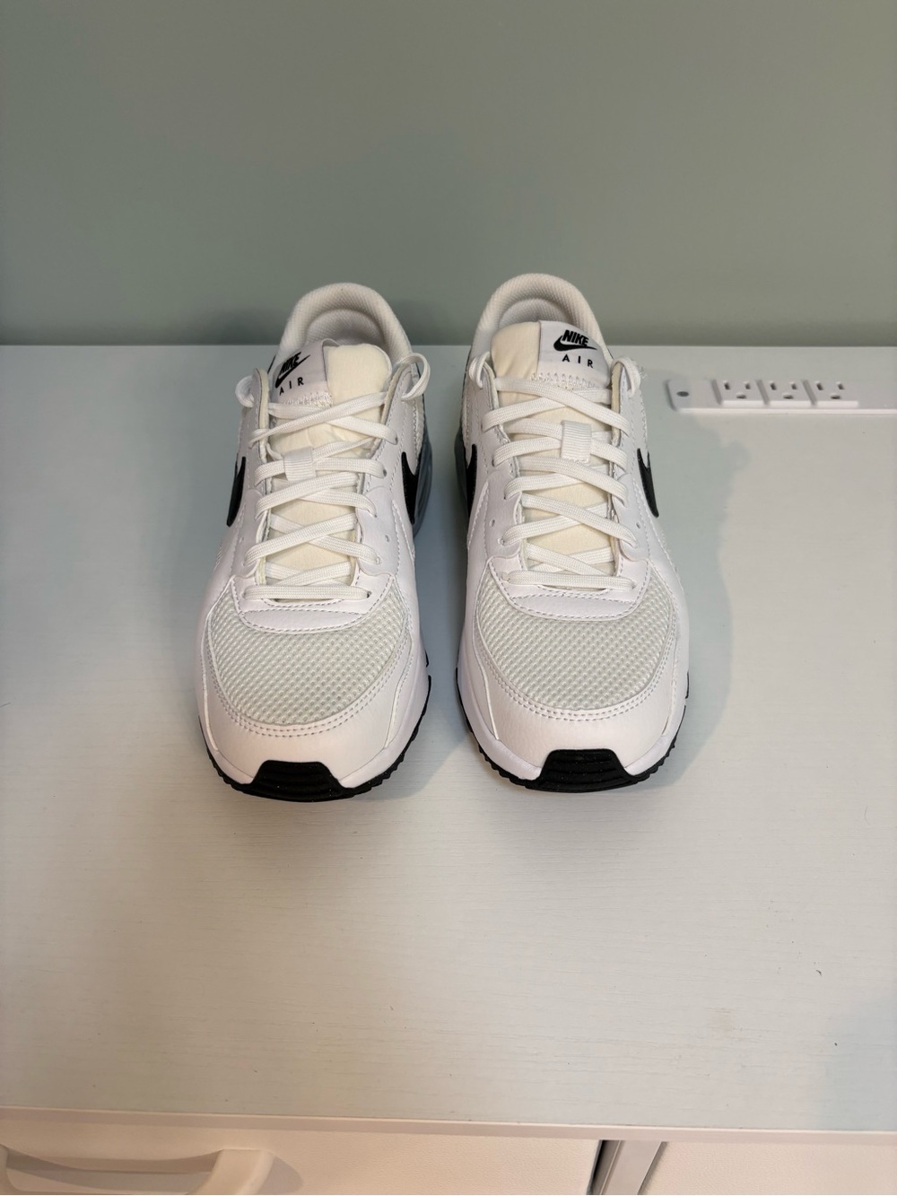 Women’s size 8 Nike White and Black Low-Top Sneakers